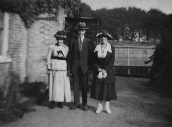 Elizabeth White, Percival and Mabel outside Abbey Cottage